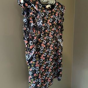 Loft sleeveless top with keyhole style opening in back in size M.